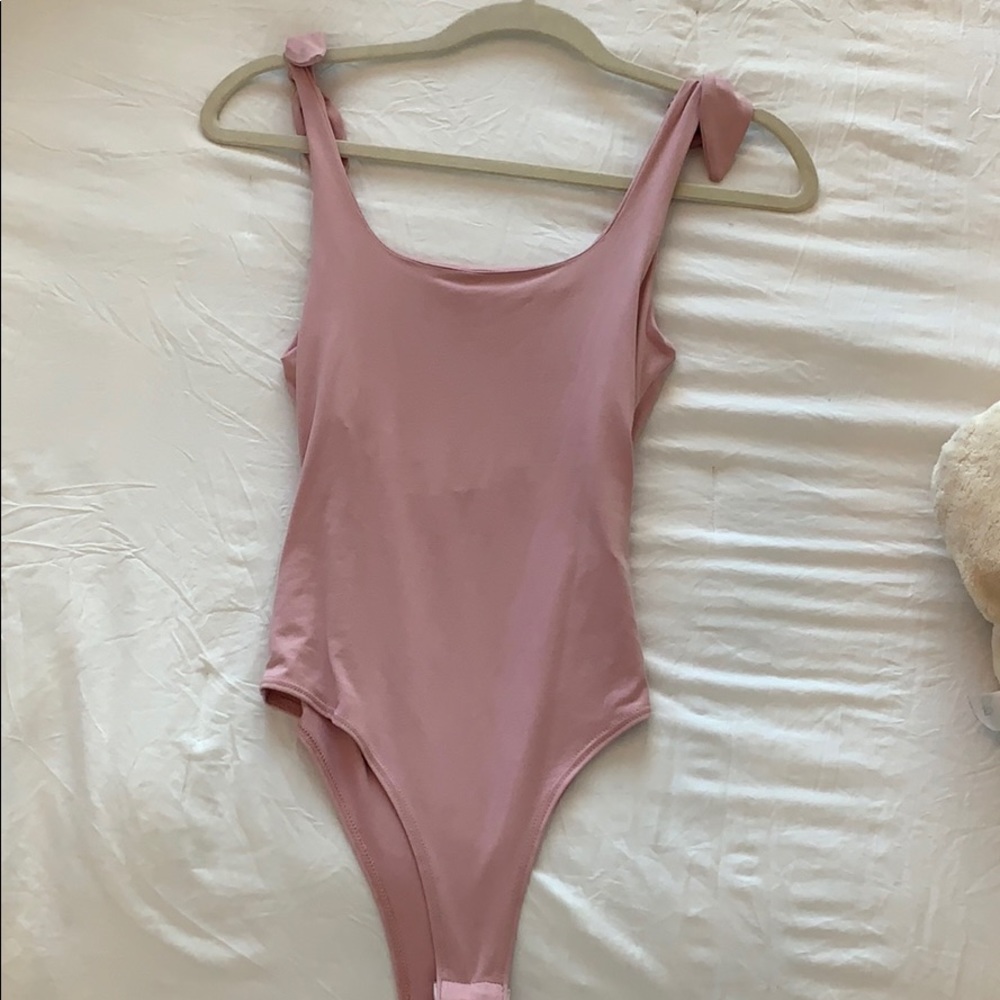 Pink bodysuit
